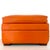 Authentic vintage 1960s orange Naugahyde (vinyl) storage ottoman. Rectangular. Wood feet. The top lifts off to reveal the...