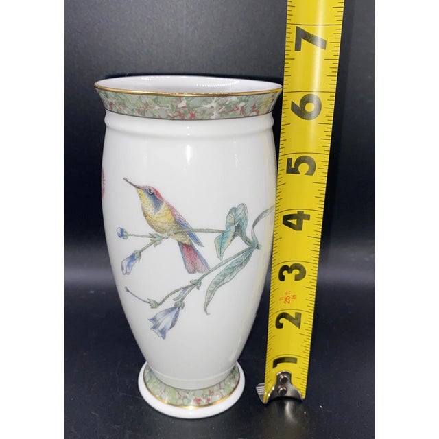 Elegant vintage Wedgwood bone china vase featuring a beautiful hummingbird design. Crafted in England in 1991, this piece...