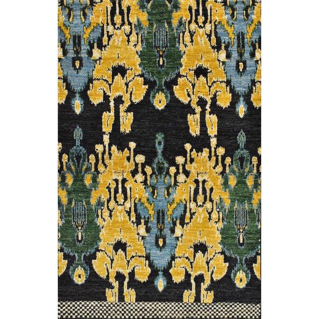 This modern Ikat rug is hand-knotted with an all-wool pile on a cotton foundation. This rug is new and in excellent...