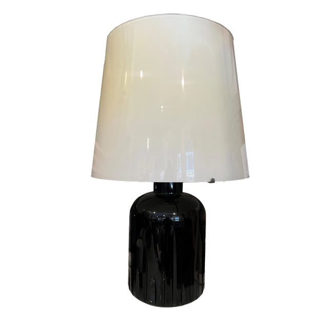 A sexy pair of Italian hand-blown Murano Glass lamps! Designed in the 1970's exclusively for a Swiss ski resort, embodying...