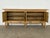 Danish sideboard in bleached solid oak, likely produced by a Danish cabinetmaker, 1960s. Four fielded doors open to two...