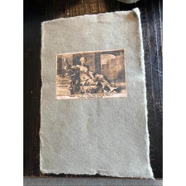 The product is a set of 8 handmade blank paper Journals, each featuring a different quote from Voltaire on the cover. The...