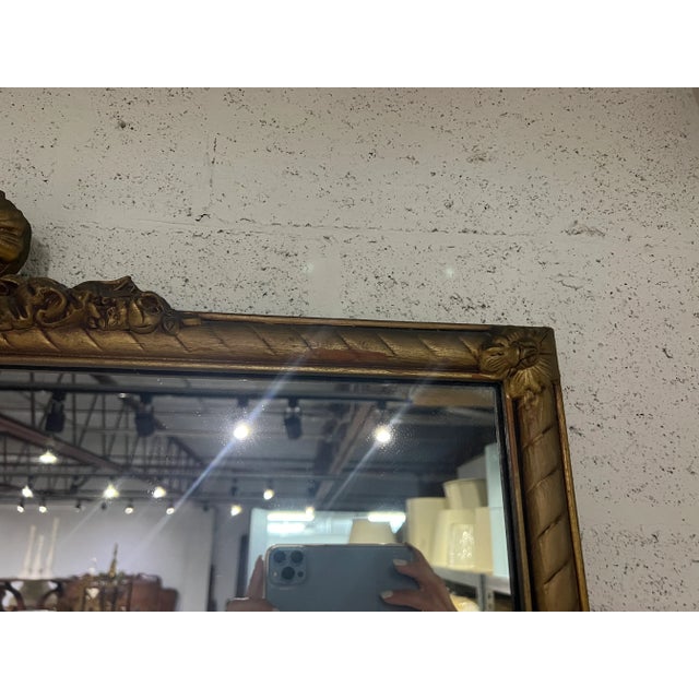 This delicately adorned wall mirror is a beauty. It is delicate and girly enough for a girls room and a powder room or...
