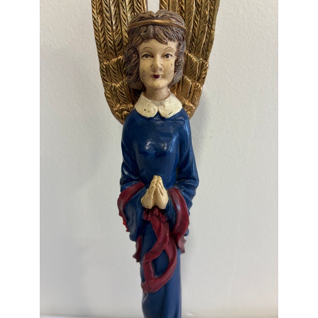 A beautiful vintage find: a carved angel figurine featuring tall, richly detailed gold feathered wings, a sweet hand-...