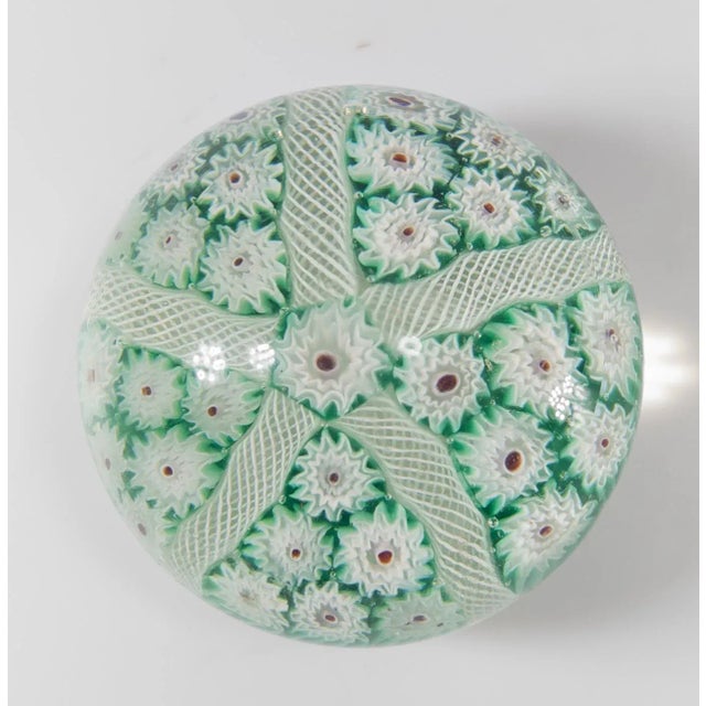 We are selling this lovely little Italian mid century glass millefiori Murano type paperweight with green color and...