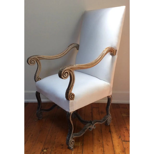 Nice large high back arm chair with older painted finish. The white cotton fabric is only pre upholstery fabric...this...
