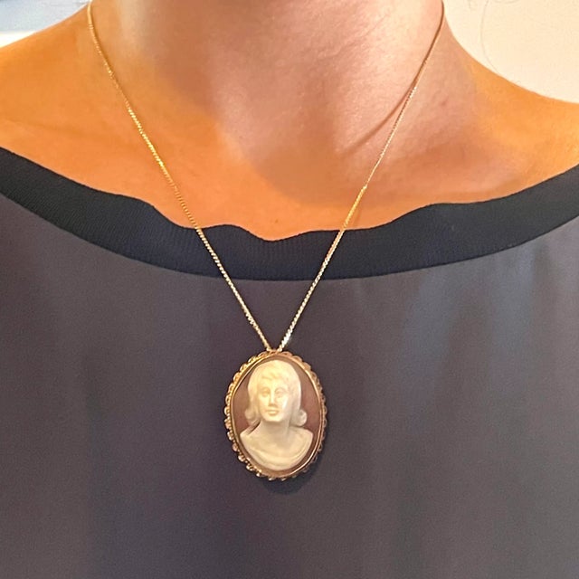 This is part of Chairish’s Fine Jewelry assortment. This is a fine 14K gold cameo which is carved in very high relief. The...