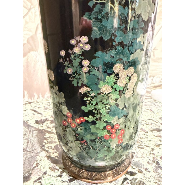 This is an exceptionally detailed and striking silver wire cloisonné vase most likely made in the late Meiji early Showa...