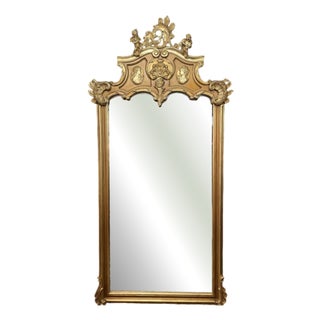 Grand French Style Gilt Mirror with Cherub and Plaques For Sale