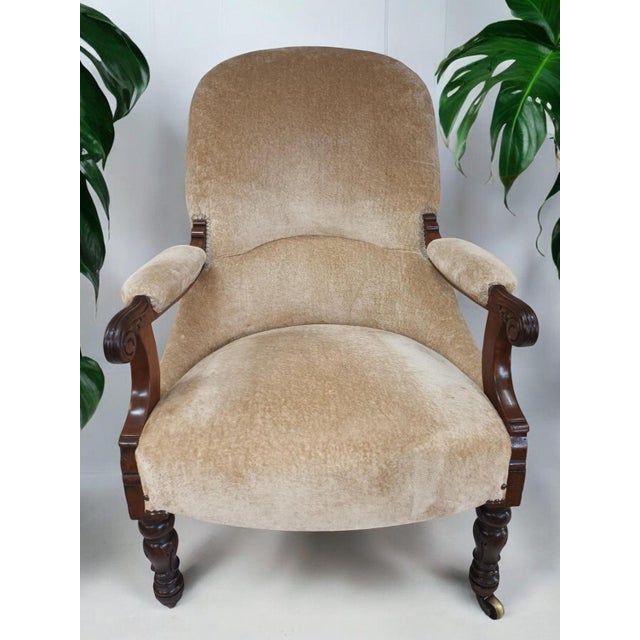 This magnificent 19th Century Victorian library armchair is a true masterpiece. Generously sized and expertly re-...