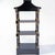 This is a pair of 20th century chinoiserie black and gilt painted pagoda form wall shelves. They have three tiers and...