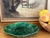 Antique majolica bread basket and two wall plates, all made in England around the 1920's. They are in the same green tone...
