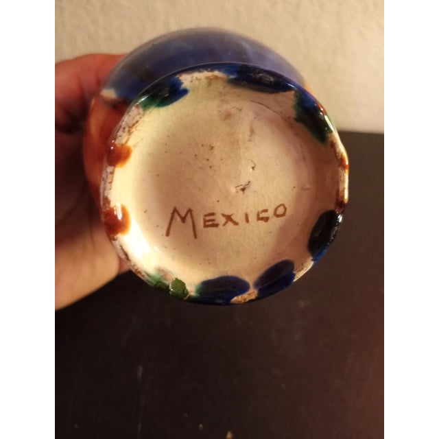 This is a Mexican Glazed Pottery 4" Creamer. Procured at auction