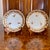 A fine pair of burnt orange red oxide and gilt decorated fluted plates in a classic Derby pattern a lively and dense yet...
