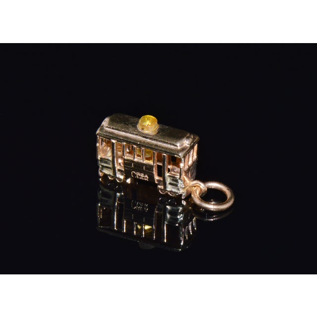 This detailed San Francisco cable car charm is crafted in solid 14K yellow gold and designed as a three-dimensional...