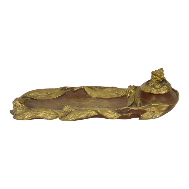 Rare inkwell with pen holder made of patinated and gilded bronze, a handmade art object entirely in the typical Art...
