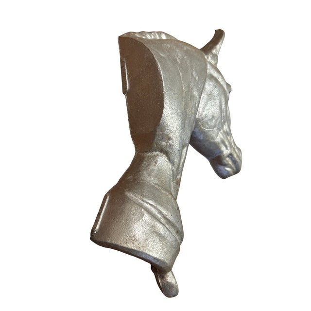 Highly detailed, heavy cast aluminum effigy of a horse head. A interesting vintage piece of wall decor. 14¼" x 10½" x 2"