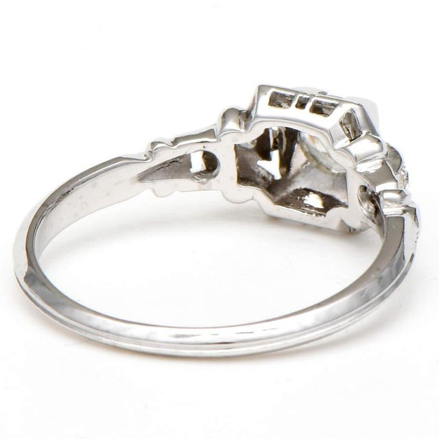 This historically beautiful diamond ring exudes romance, luxury and aesthetic appeal. Glamorous diamonds and winsome white...