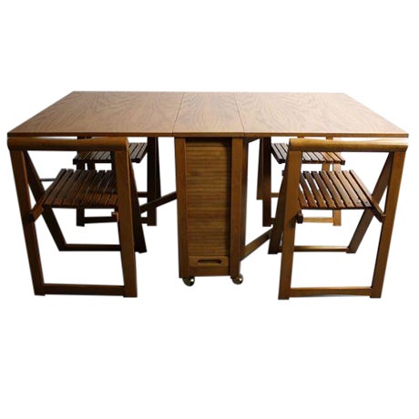 Danish Modern Drop Leaf Hide Away Dining Set For Sale