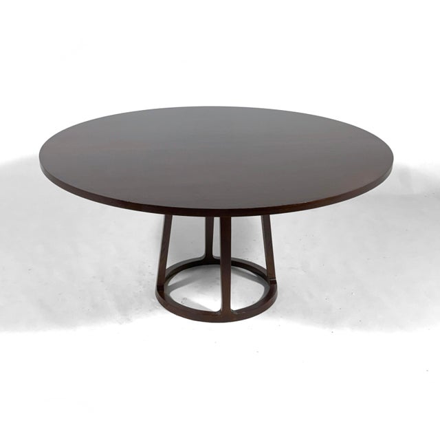 This beautifully crafted and subtly designed dining table by Baker features a five foot round oak top that comfortably...
