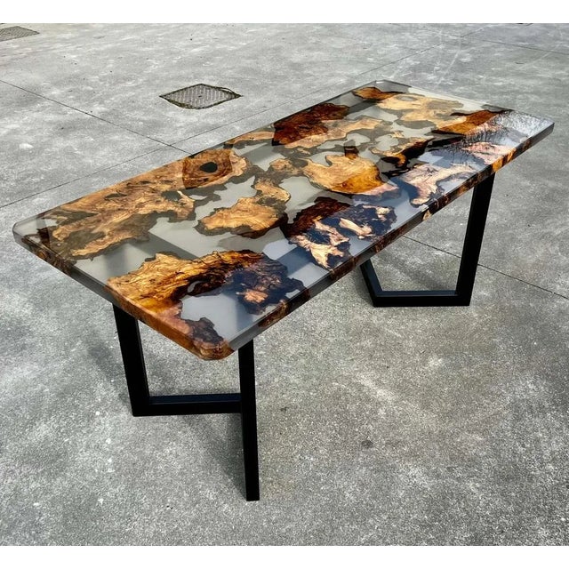Radish is a dining table made of wood and epoxy resin. In this River Table two steps of Lecce olive and epoxy resin are...