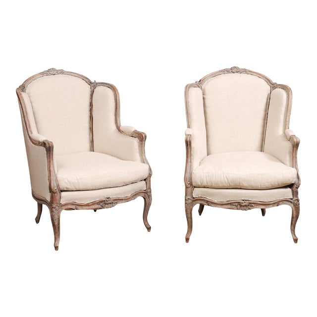 French Louis XV Style 1880s Painted Bergère Chairs with Carved Floral Motifs - A Pair For Sale