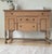 Dimensions: 54"L x 39"H x 19"D Tiger Oak quarter sawn solid wood sideboard / buffet with scalloped apron turned legs,...