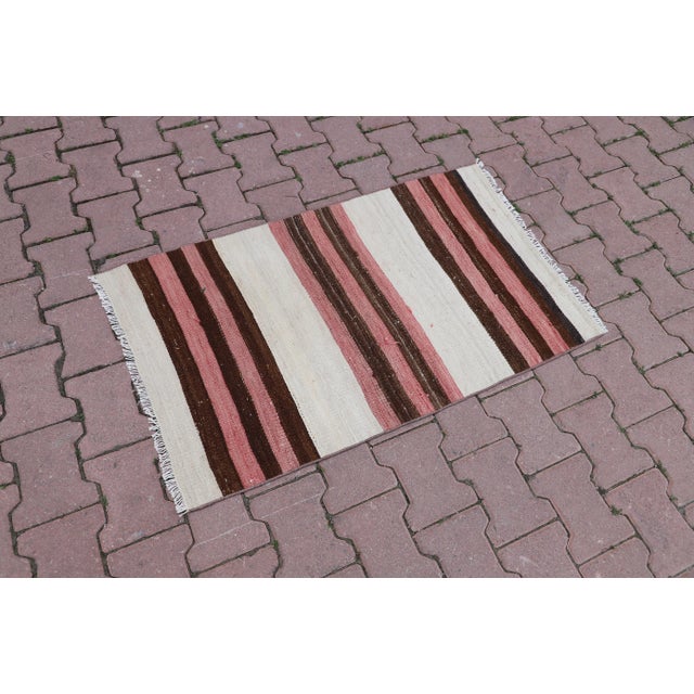 Size: 2.2 x 3.5 ft ( 67 x 108 cm) 26 x 42 inches Color: Pink, Brown, Beige Material: 100% Hand Spun Organic Wool...