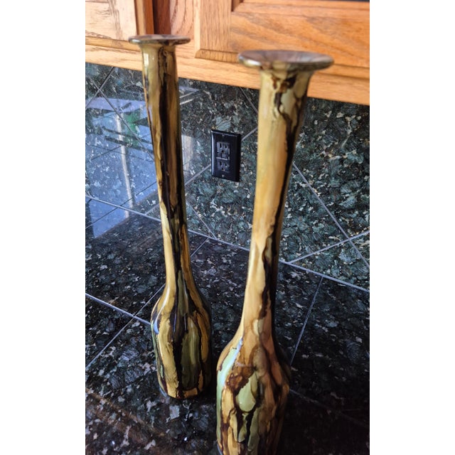 From the living estate of Arizona based brutalist sculpture artist John Gleason, this striking pair of vintage mid-century...