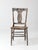Antique 19th-century American country chair with a graceful lyre-shaped back and tall, slender profile. Faded gray-blue...