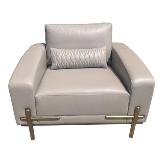 Theodore Alexander Contemporary Taupe Leather Lounge Chair With Brass Accents For Sale