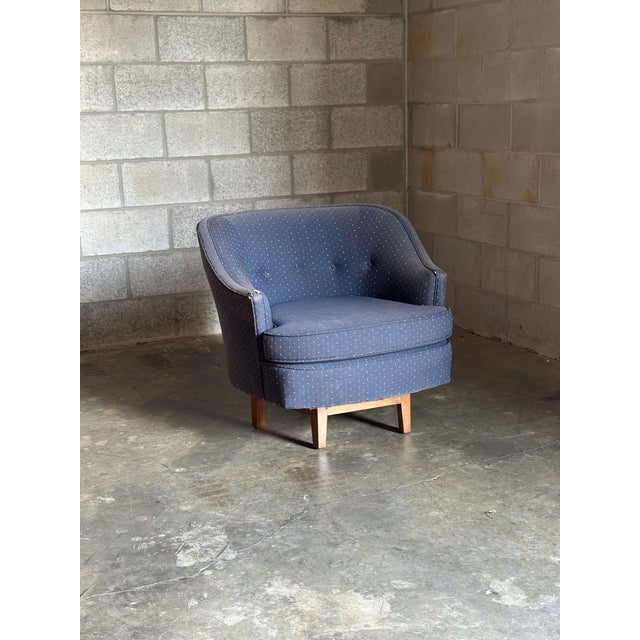 A really great and not so common swivel chair designed by Edward Wormley for Dunbar. Great scale chair over a walnut...