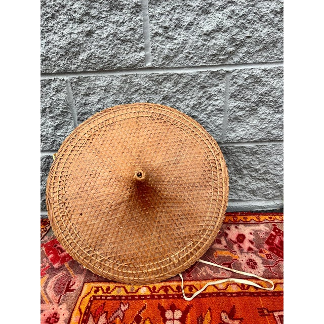 What a great way to accent all your bamboo rattan and chinoiserie! This size was more than likely a woman's hat as it is a...