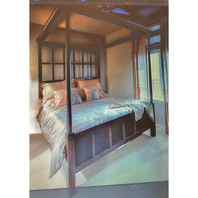 An slightly modernized English Tudor style king size four poster paneled bed with canopy by Lexington. Model, 568-174C....