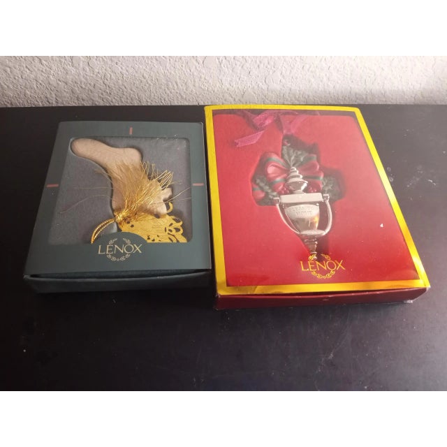 These are STUNNING NEW IN BOX Lenox Ornaments Set of 2. Green Box of Porcelain Stocking Ornament Red Box of Brass Door...