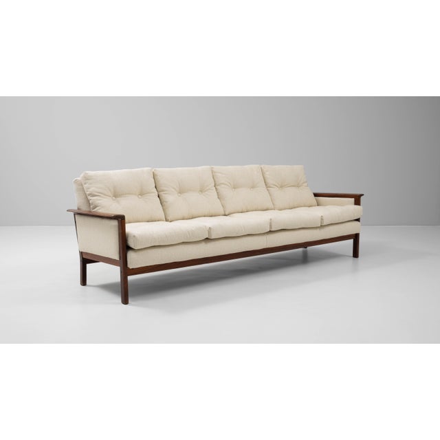 This 1960s Danish upholstered sofa by Hans Olsen is a refined example of Scandinavian modern design, combining elegant...