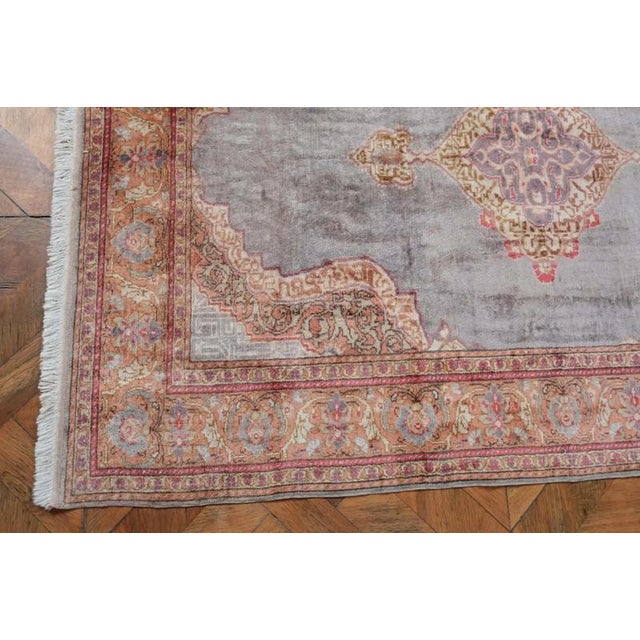 Hand-knotted silk rug from the Turkish city of Kayseri. Silk on cotton warp. Fine weave with a density of around 250,000...
