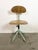 This industrial height adjustable, rotating chair was made in former Czechoslovakia during the 1950s.It features a green...
