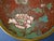 This antique Chinese cloisonné dish features intricate enamel detailing in red of flowers. The vibrant multicolor design...