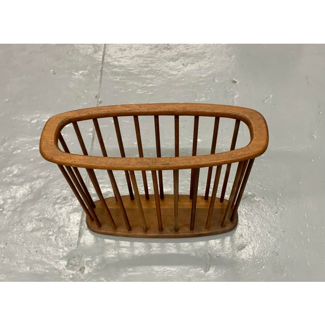 1960s Mid Century Spindled Magazine Holder / Rack Description Add a touch of mid-century modern charm to your home with...