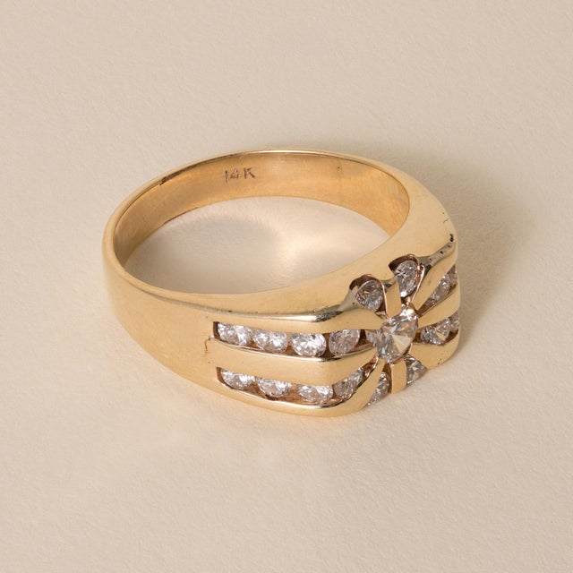 Vintage Starburst Diamond Ring 14K Gold Circa 1980s A bold vintage statement ring featuring a radiant starburst design...