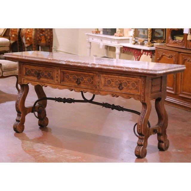 Bring architectural scale and old world character to an interior with this impressive antique console table crafted in...