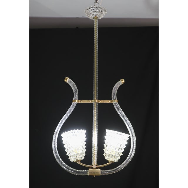 Incredible Murano glass Light in clear rostrato from the middle of the last century. This wonderful light was produced in...