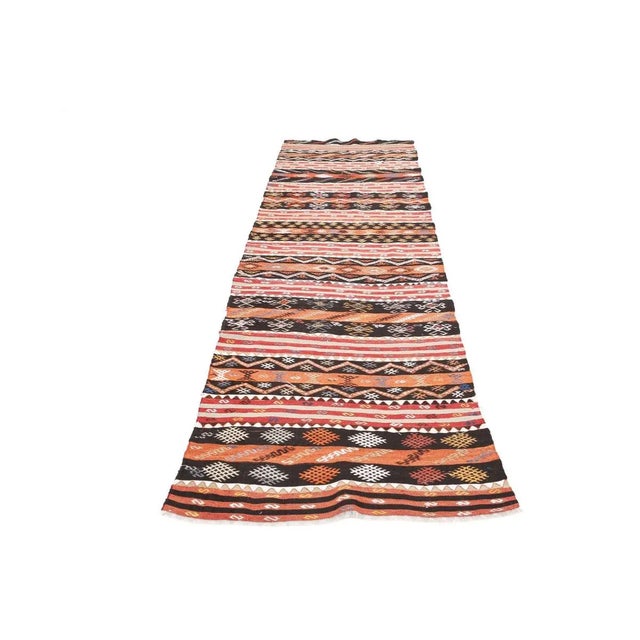 Vintage handwoven decorative kilim rug from Malatya region of Turkey. Approximately 50-60 years old. In very good condition.