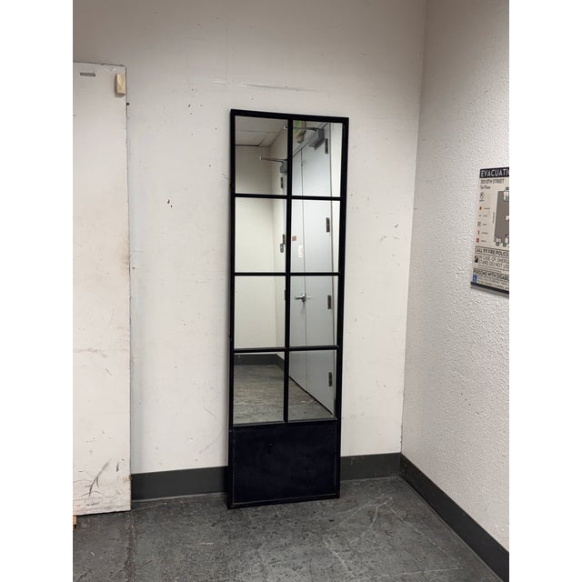 Design Plus Gallery presents a Full Length Mirror from Bid K Home. The Mirror has an eight rectangular windows arranged in...