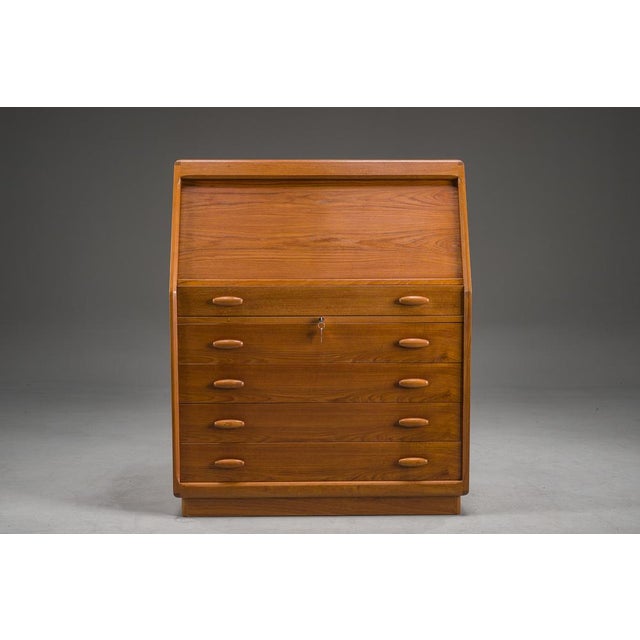 Elegant danish mid-century secretary cabinet by dyrlund, crafted in teak and featuring a hidden mirror compartment with...