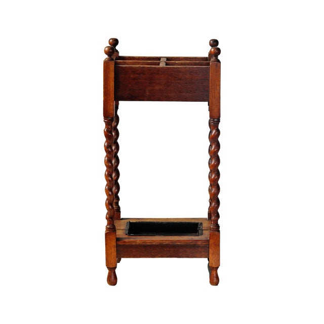 Antique barley twist umbrella and stick stand, dating from the late 19th century to the early 20th century (Victorian or...