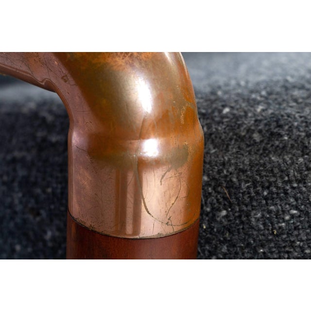 This extraordinary lounge chair is unlike any we've ever seen and is as comfortable as it is unique. Built of solid walnut...