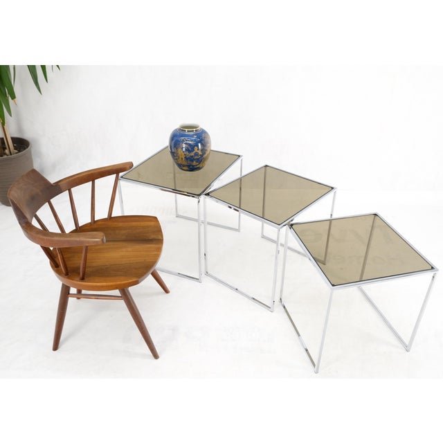 Set of wide rectangle shape chrome & smoked glass nesting end side tables. Studio made set of Mid-Century Modern...