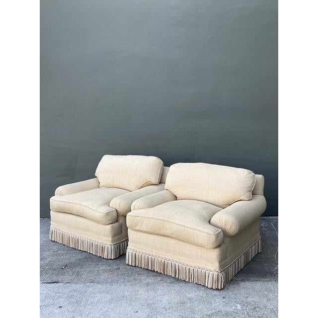 This magnificent pair of overstuffed lounge chairs by Jack Phillips epitomizes the height of "Grandmillennial" and...